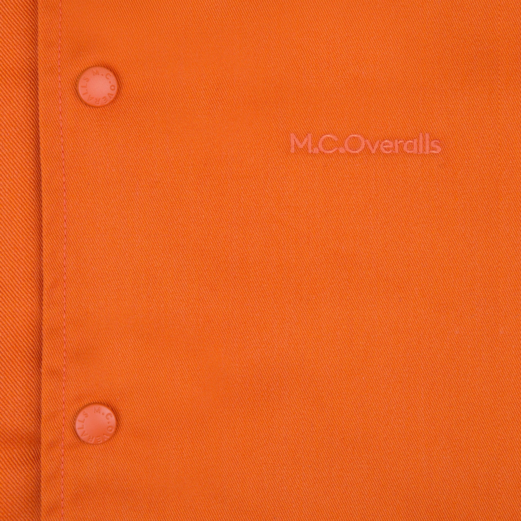 Logo of M.C.Overalls on Workwear Polycotton Orange Coach Jacket.