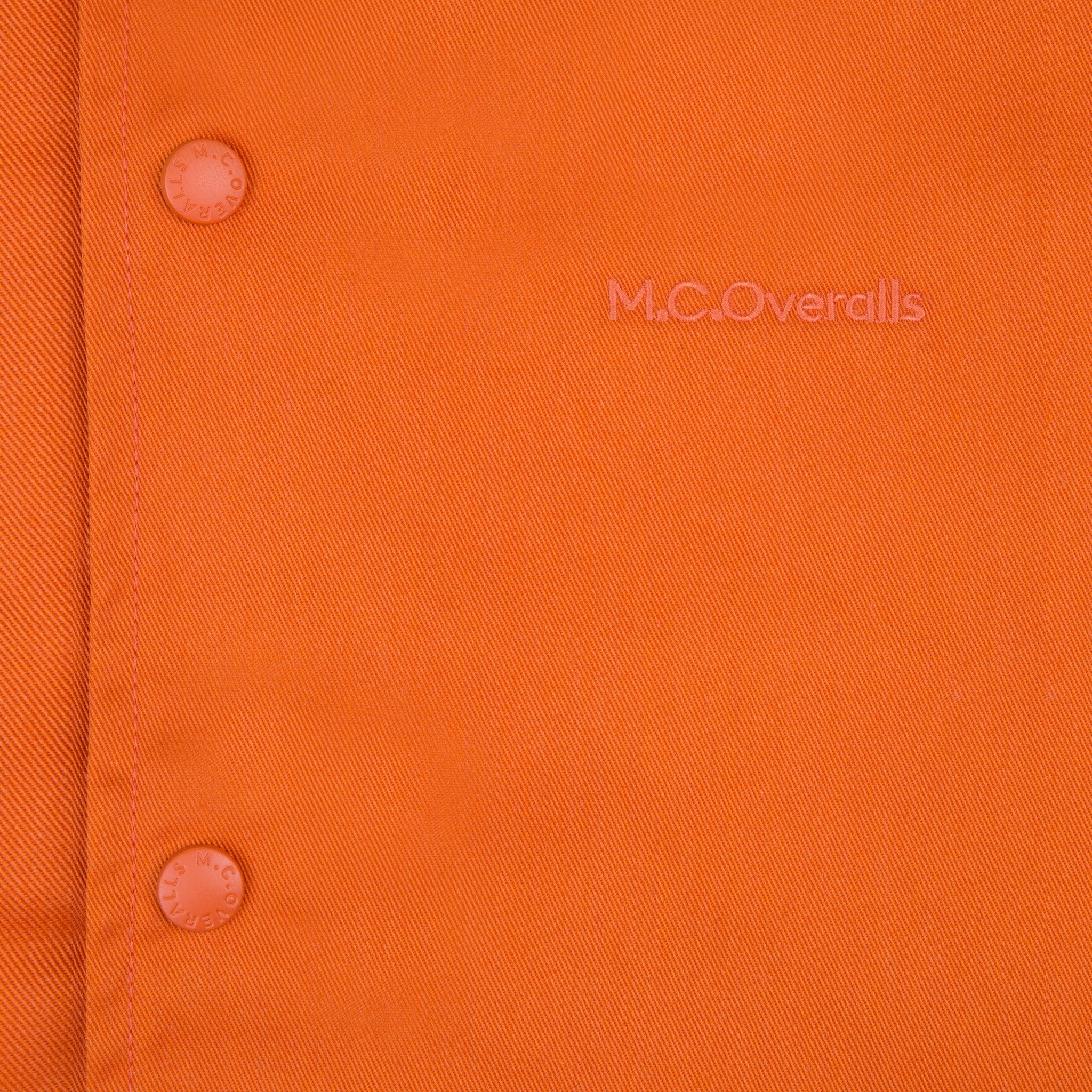 Logo of M.C.Overalls on Workwear Polycotton Orange Coach Jacket.