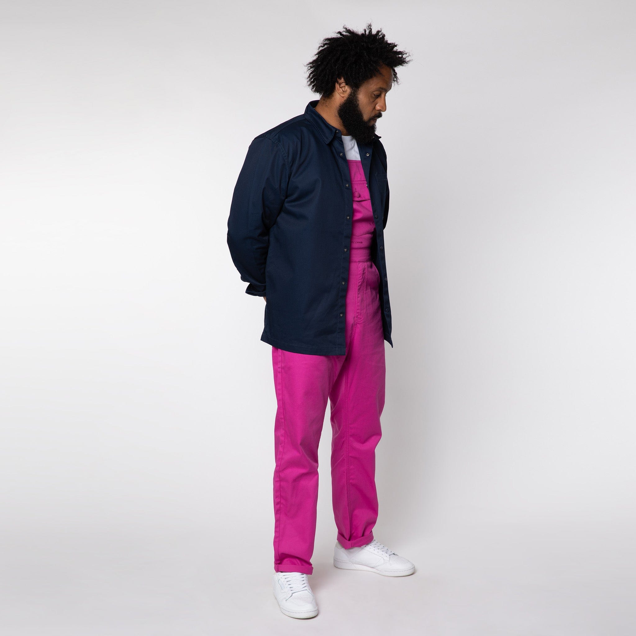 Men's Navy Snap Shirt Paired With Fuchsia Dungarees.