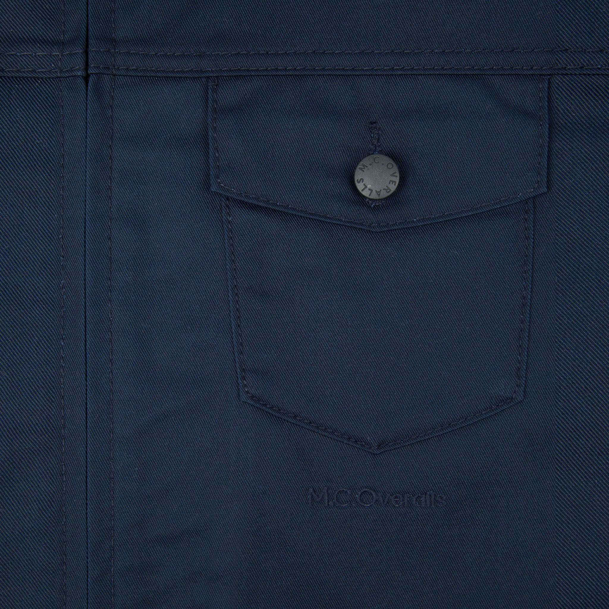 M.C.O&#39;s Logo Under the Pocket of Navy Work Overalls.
